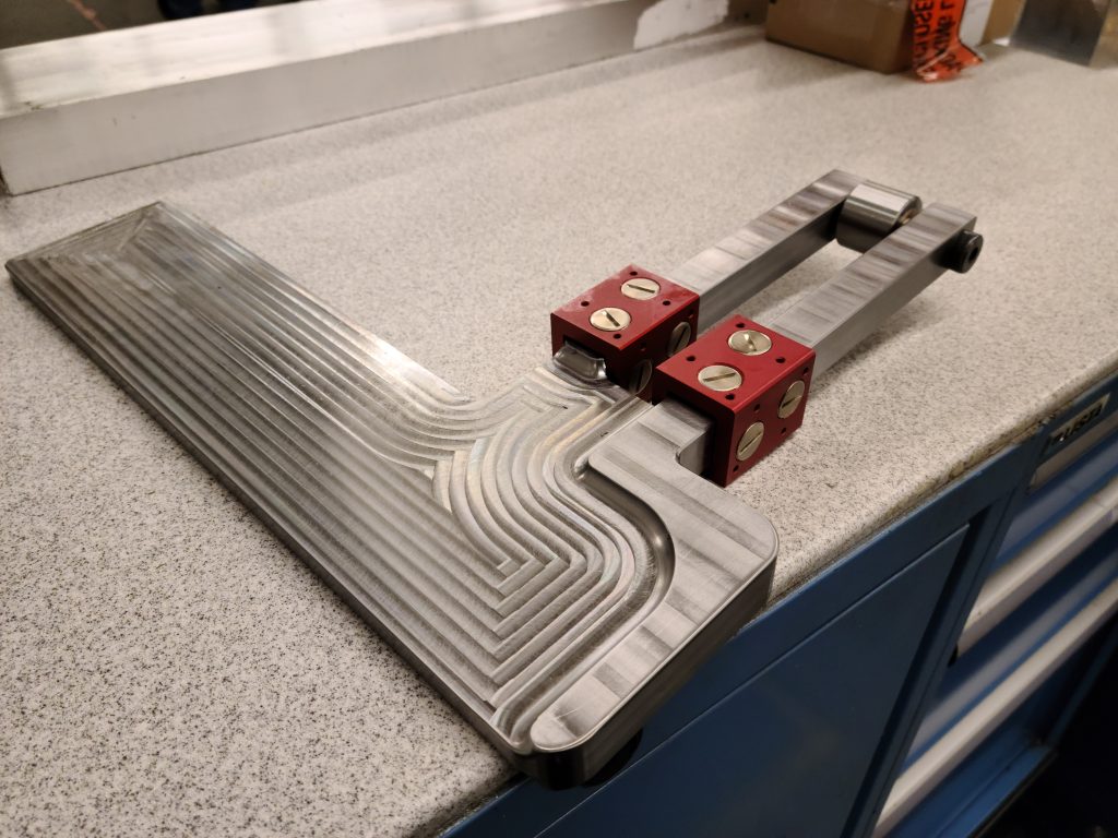 Machined plate and roller assembly